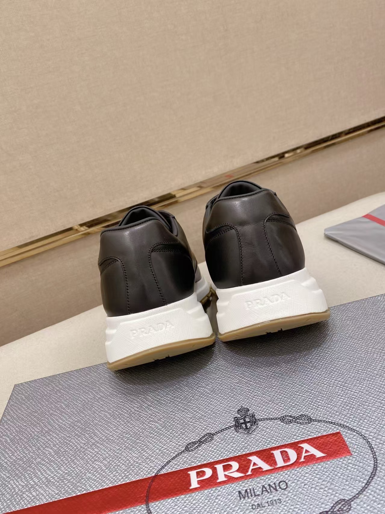 Prada Prax 01 Black Leather Sneakers - 45mm Rubber Sole & Enamel Triangle Logo