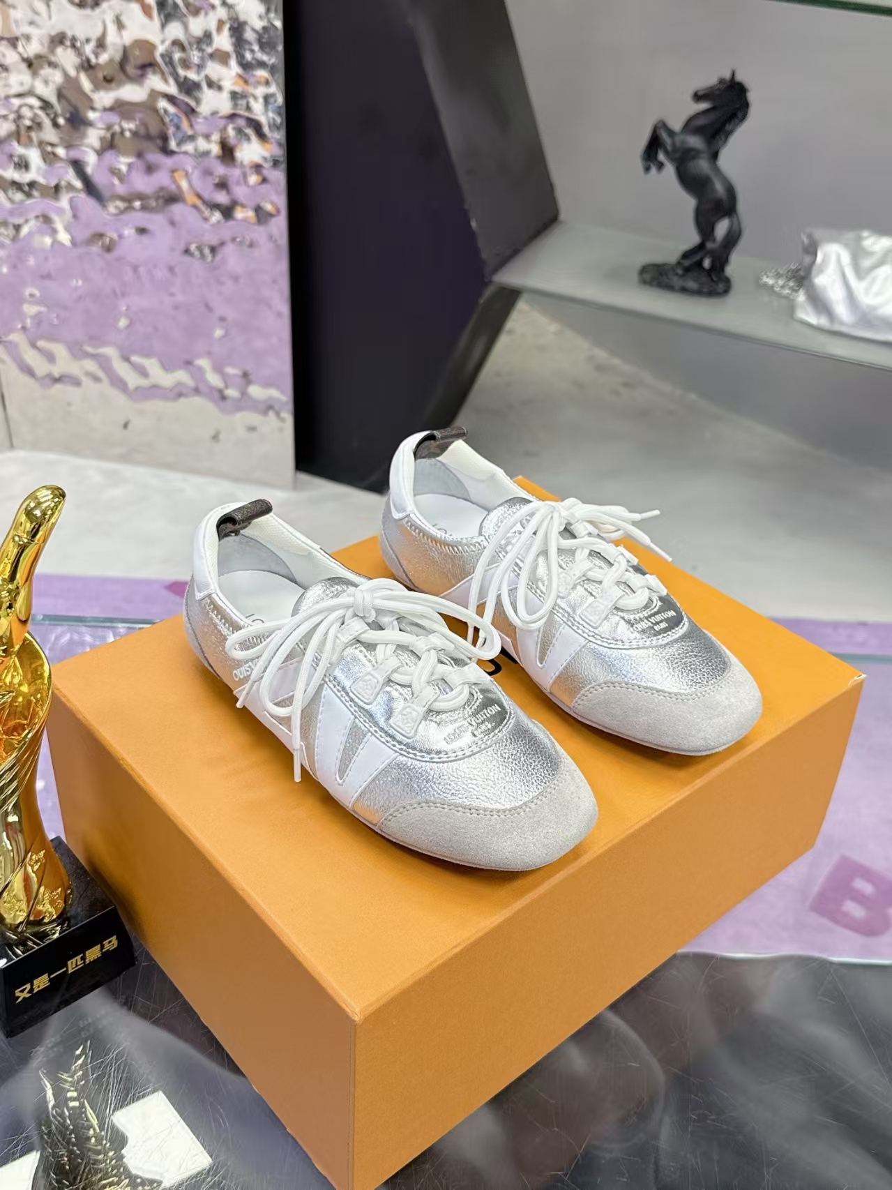 Louis Vuitton Sneakerina Flats in White & White & Silver