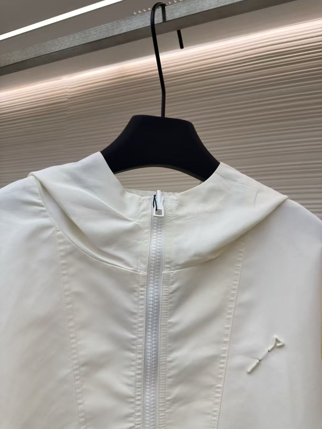 LOUIS VUITTON Reversible Monogram Windbreaker with Detachable Pin in White