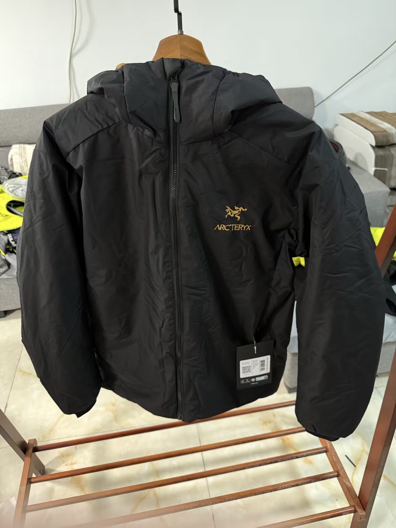 Arc'teryx Atom LT Hoody in Black/Gold - Lightweight Synthetic Insulated Jacket for Outdoor