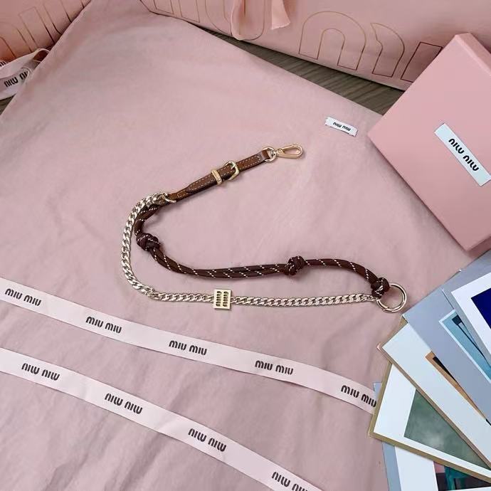 Miumiu leather, rope and metal pendant keychain