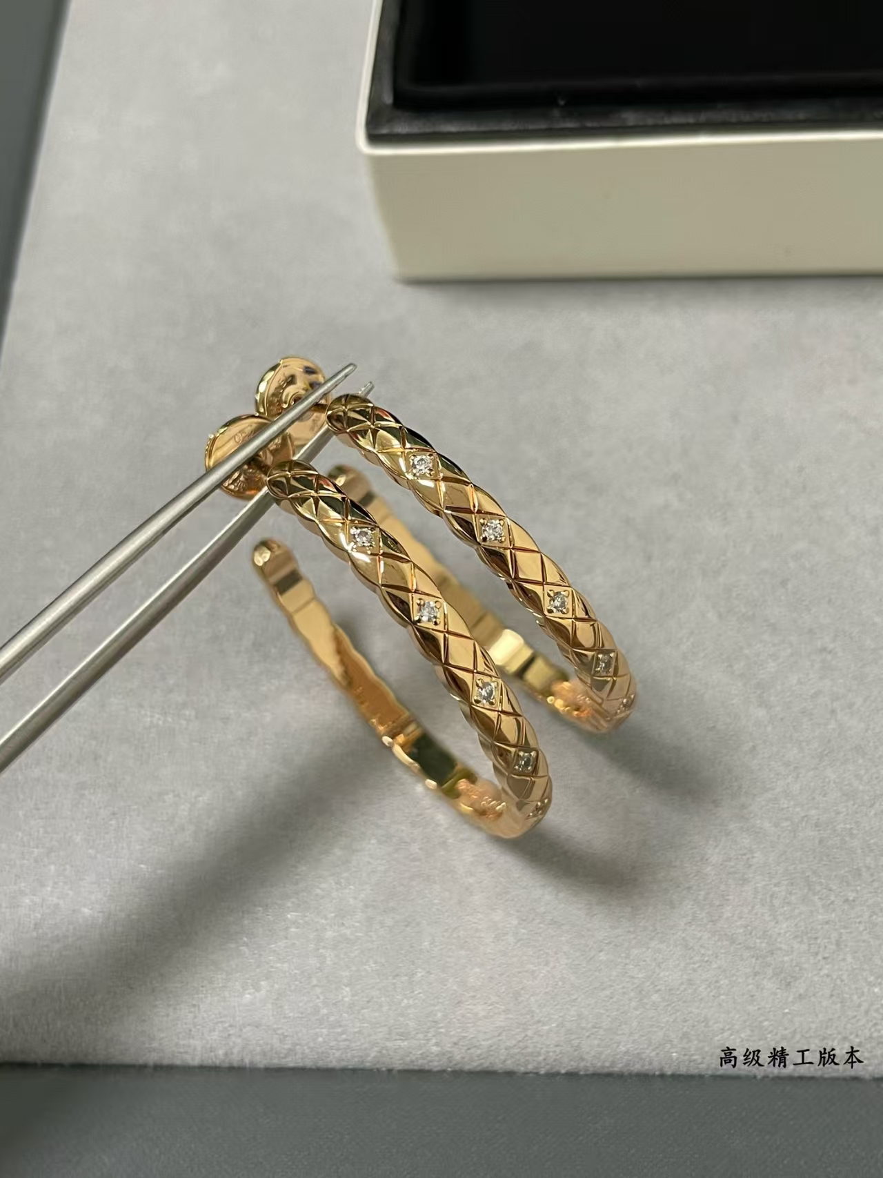 CHANEL Large Intricately Carved Quilted Diamond-Studded Earrings