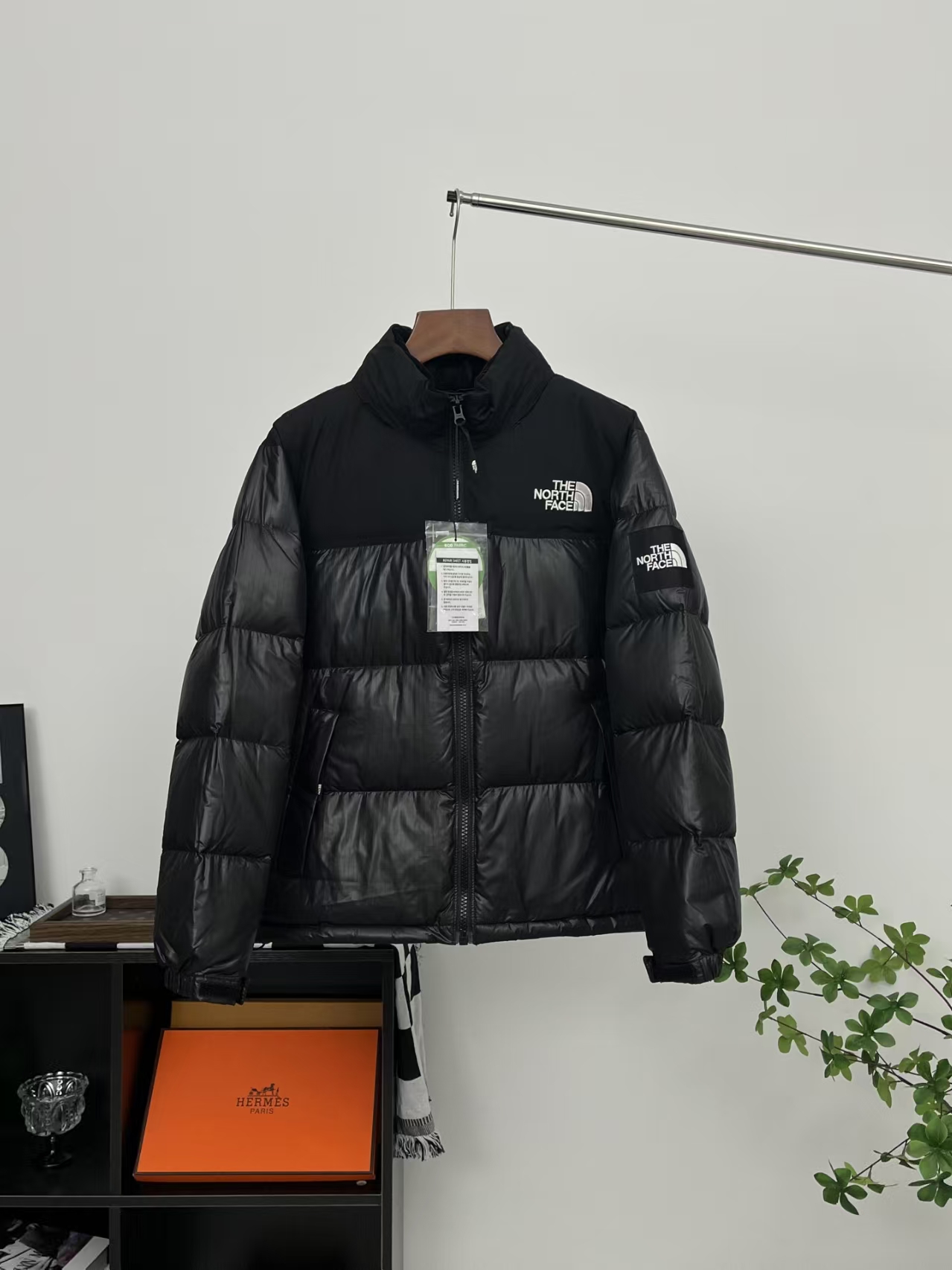 The North Face Ripstop Logo Puffer Jacket in Black | Abrasion-Resistant Oversized Graphic Design