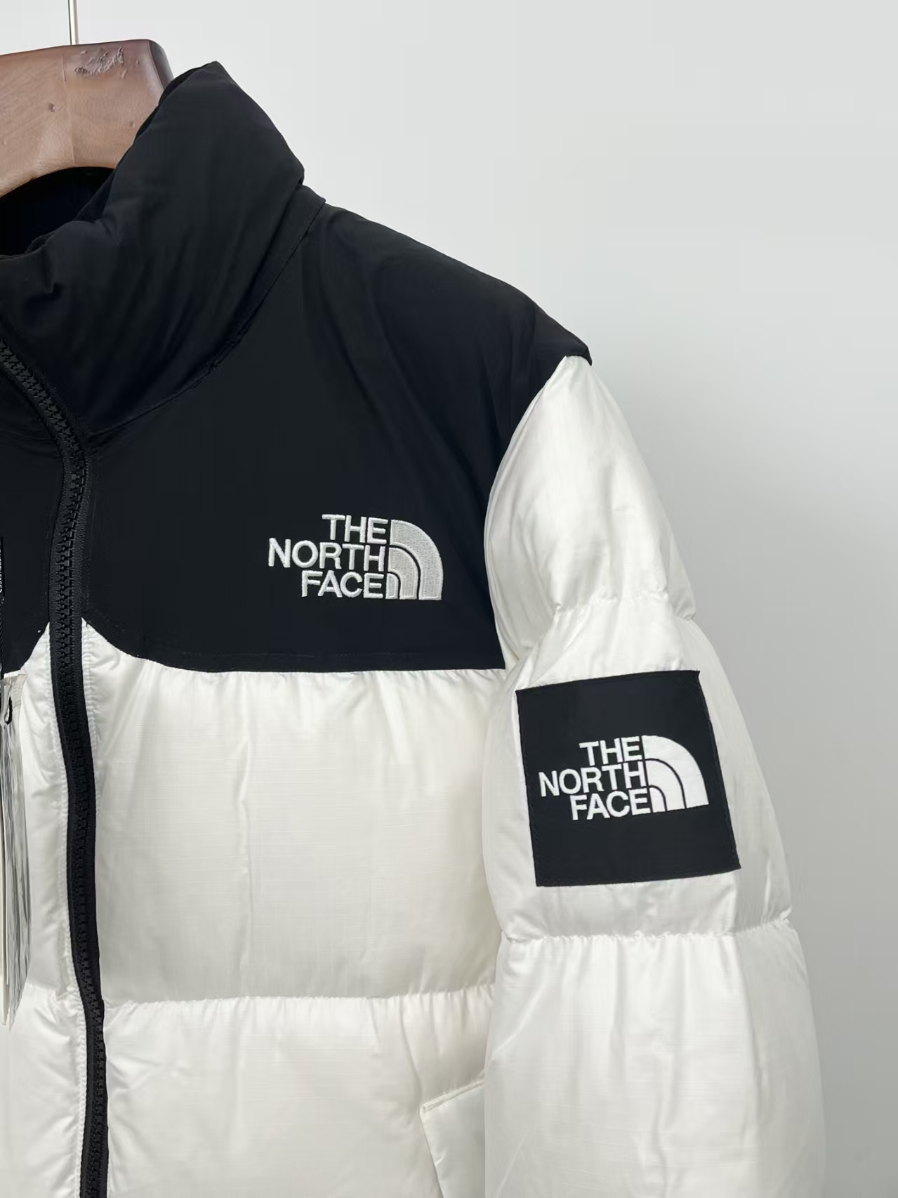 The North Face Ripstop Puffer Jacket in White & Black | Two-Tone Abrasion-Resistant Winter Coat