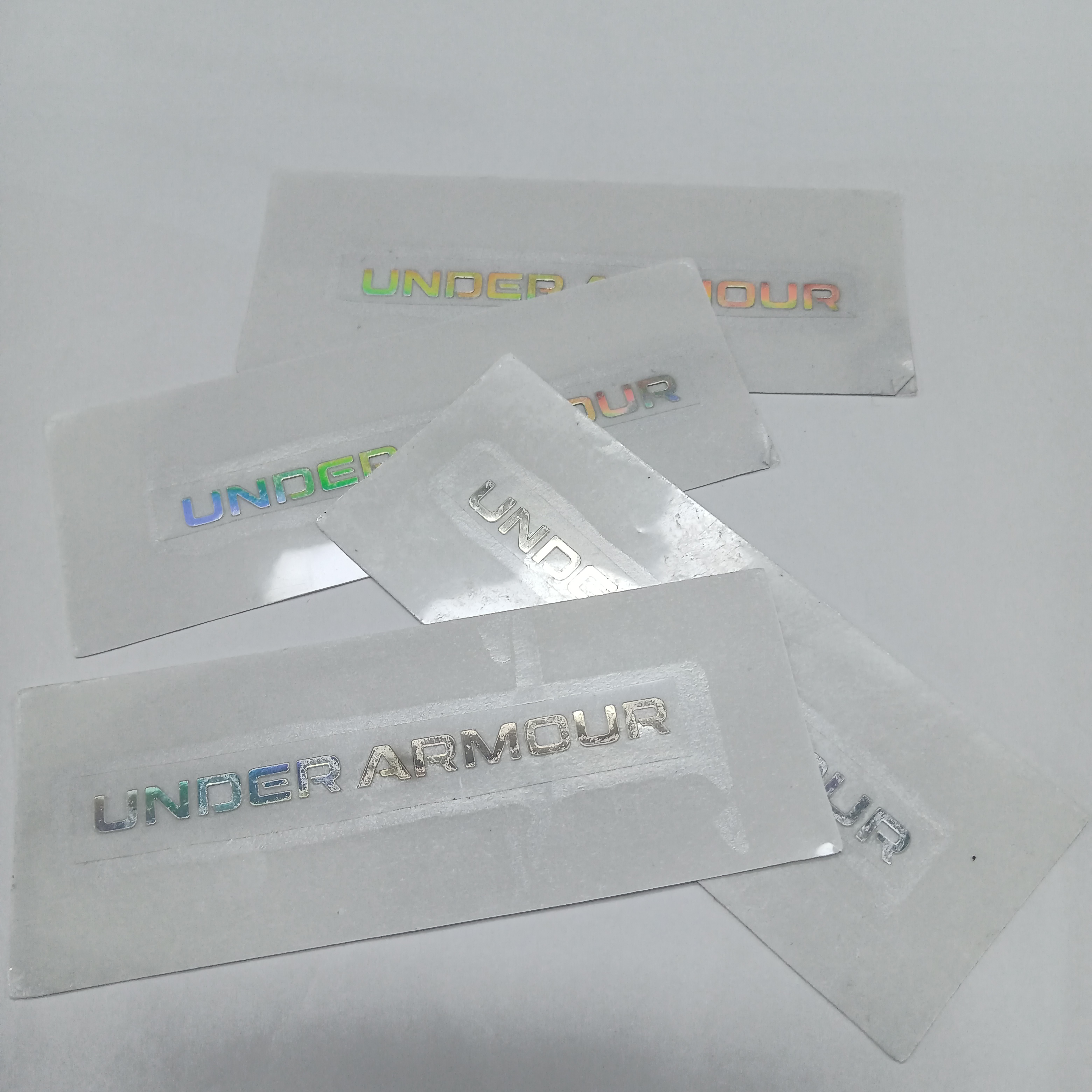 Hot Foil Stamping Holographic Self Adhesive Sticker UV Embossed Gold Foil Printing Custom Logo Stickers Transparent Label