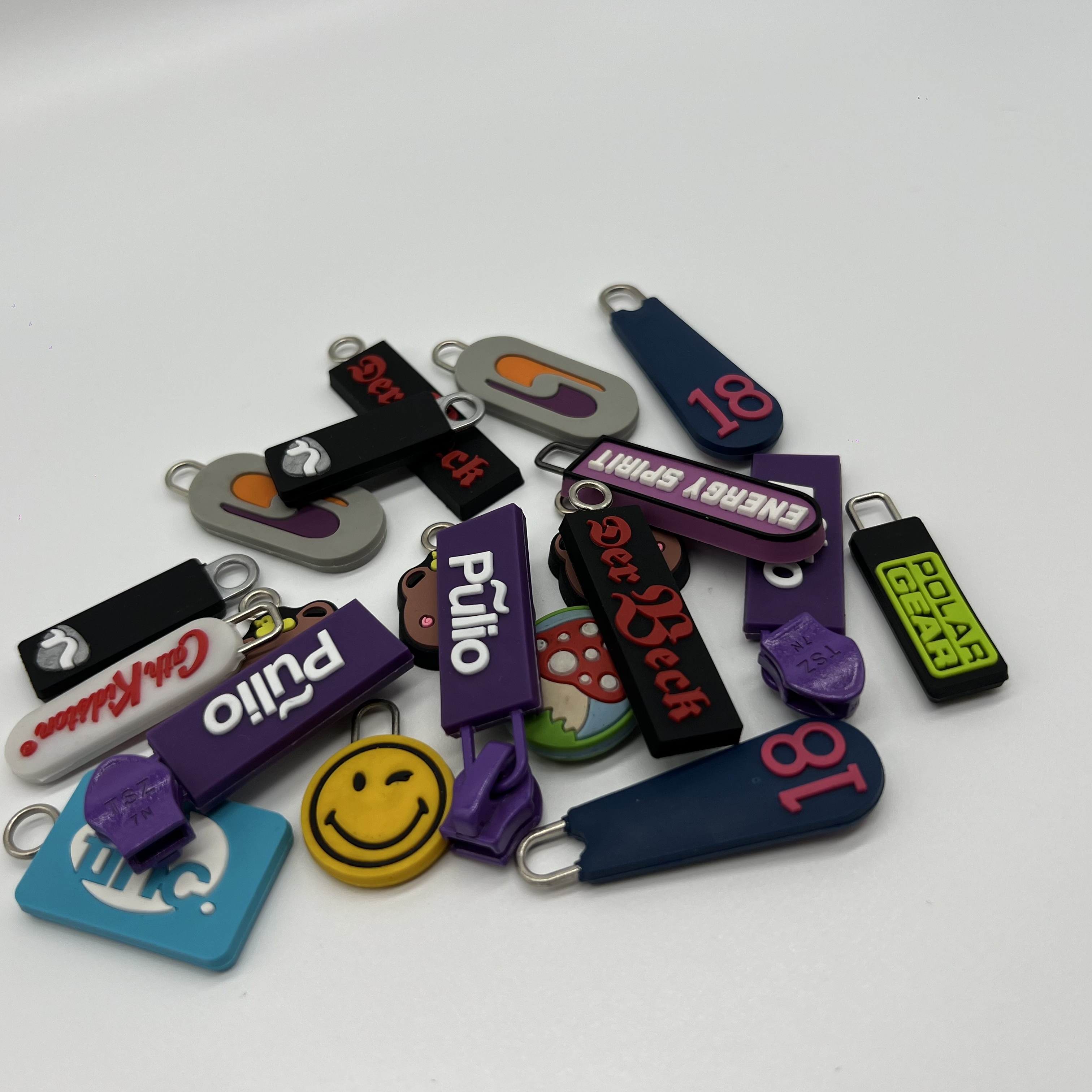 Custom Silicone Zipper Pulls & Sliders for Fashion Bags | Personalized Logo Zip Accessories