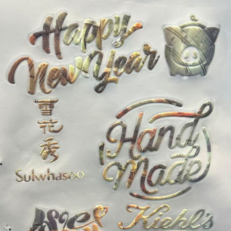 Holographic Hot-Foil + UV Emboss Custom Clear Stickers – Gold Logo, Transparent Label, Low-MOQ