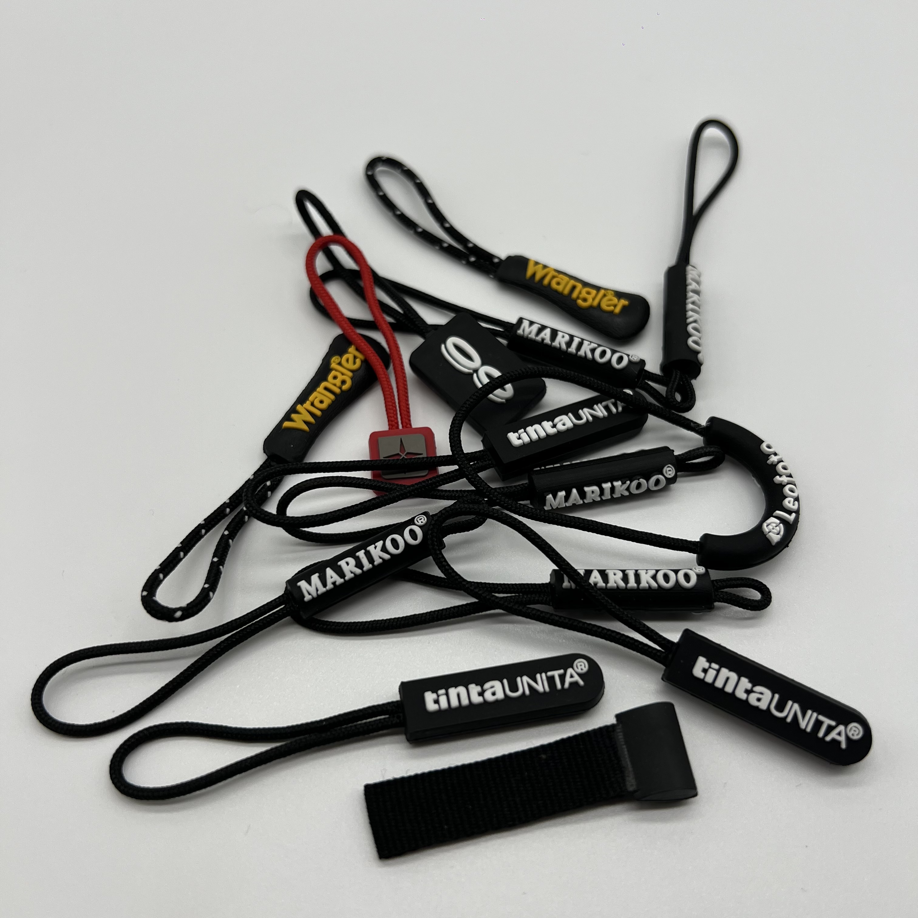 Silicone Zipper Pulls | Branded Garment Trims for Streetwear & Outdoor Apparel