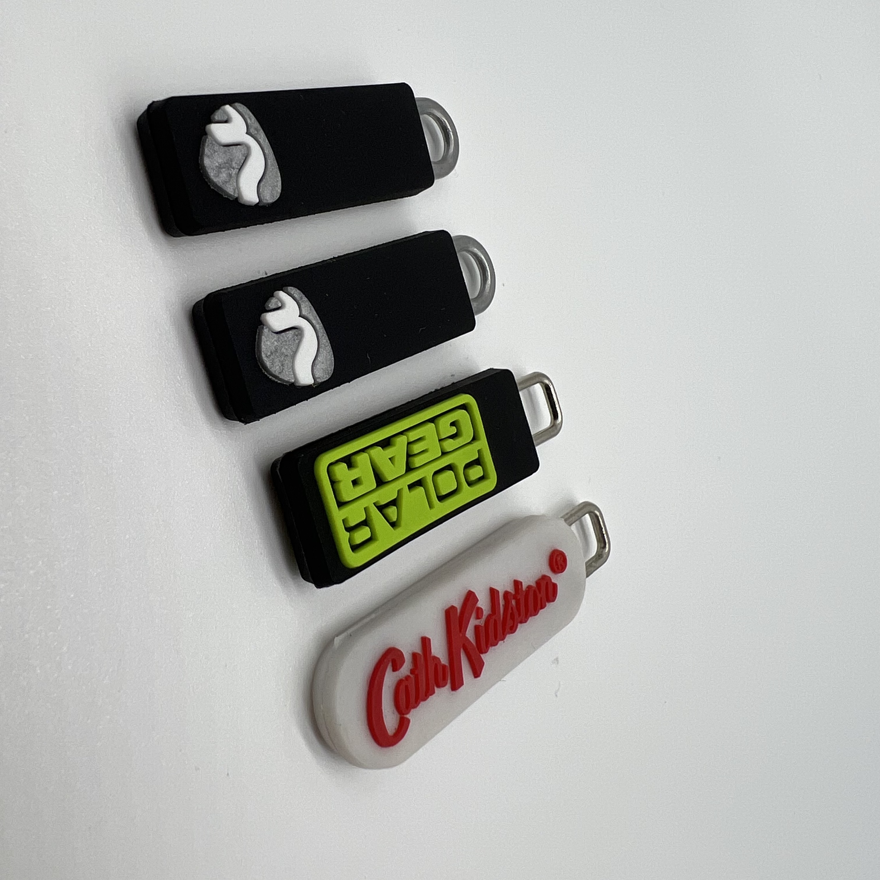 Silicone Zipper Pulls | Branded Garment Trims for Streetwear & Outdoor Apparel