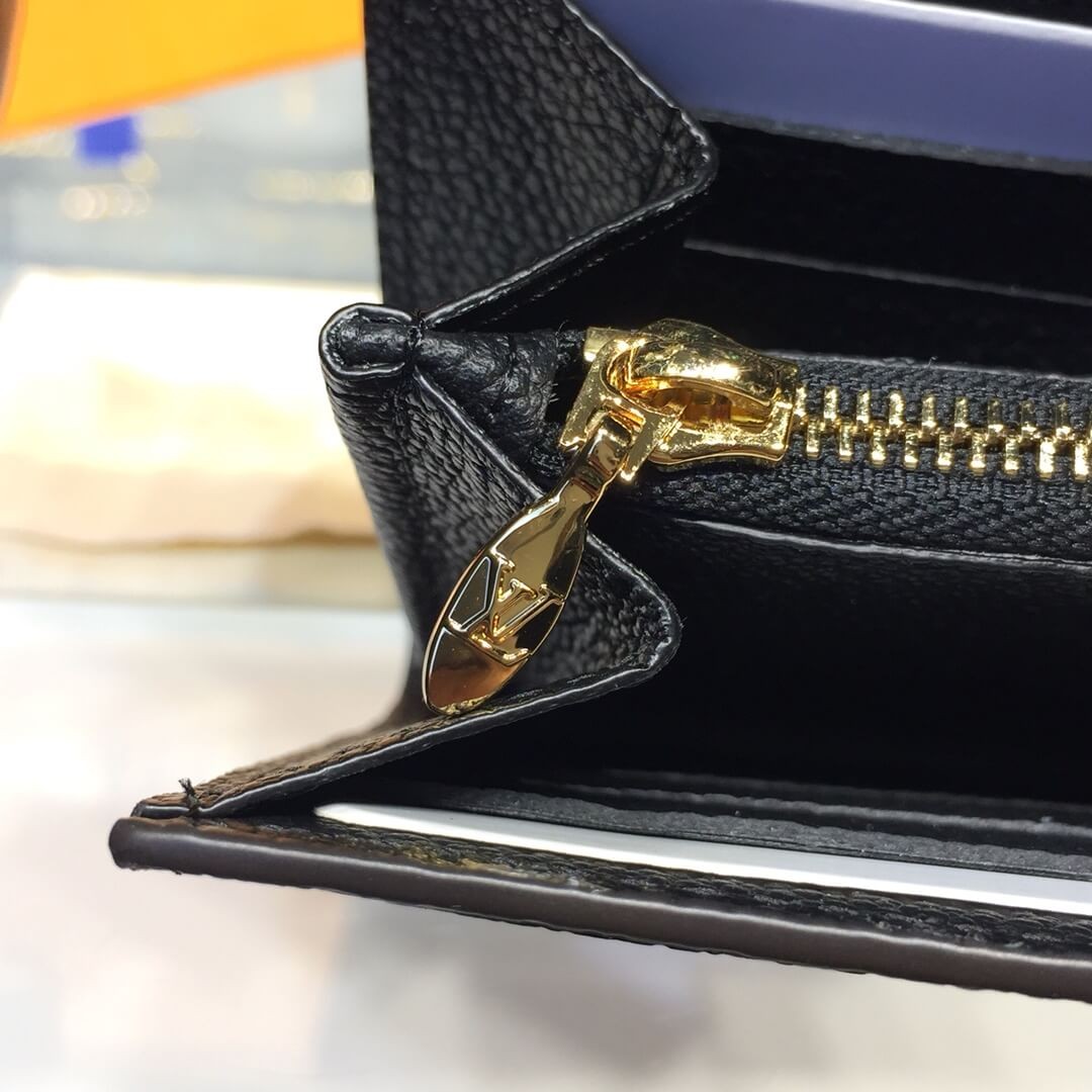 Louis Vuitton Damier Ebene Clapton Wallet N64449