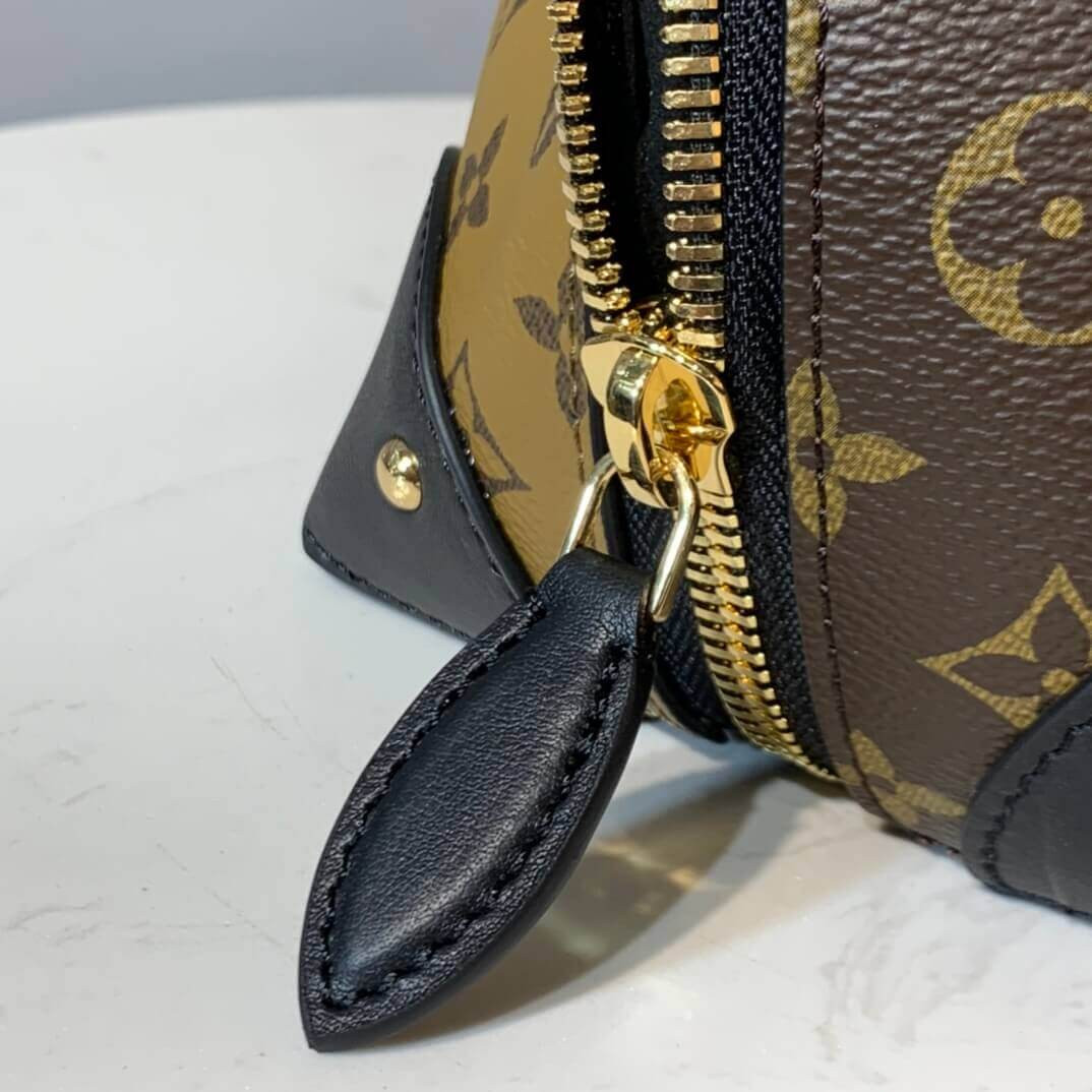 Louis Vuitton Monogram Canvas Triangle Softy M44130