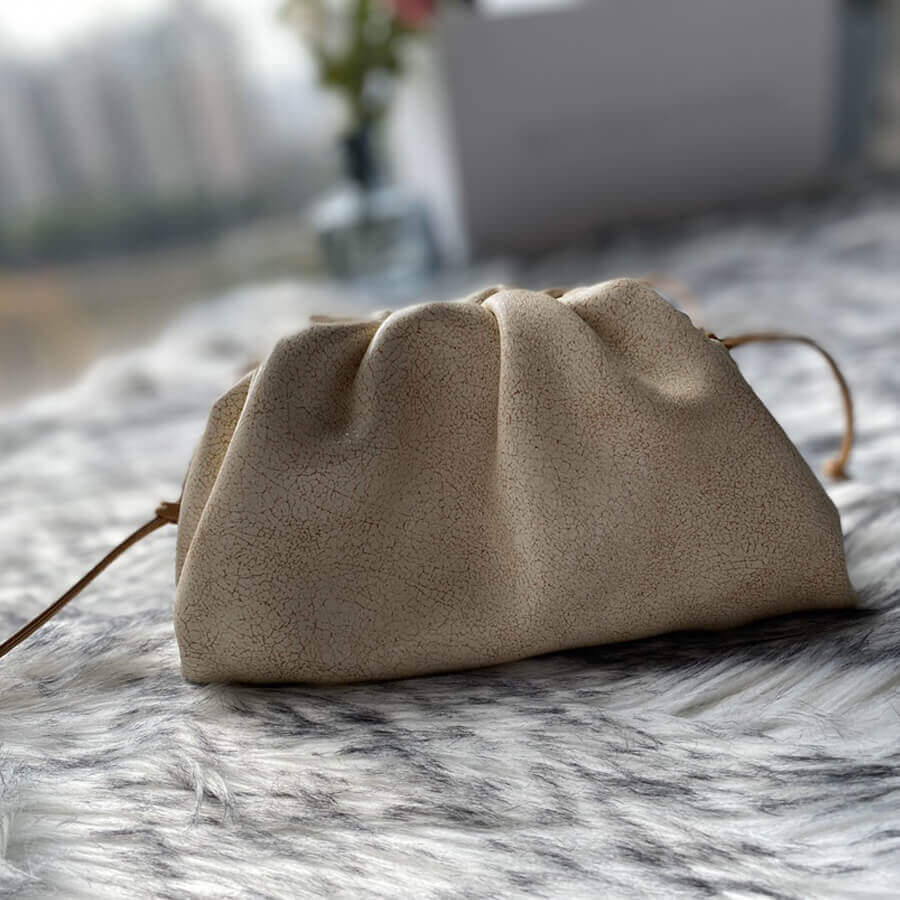 Bottega Veneta The Pouch 20 Clutch In Beige Craquele Leather 570927