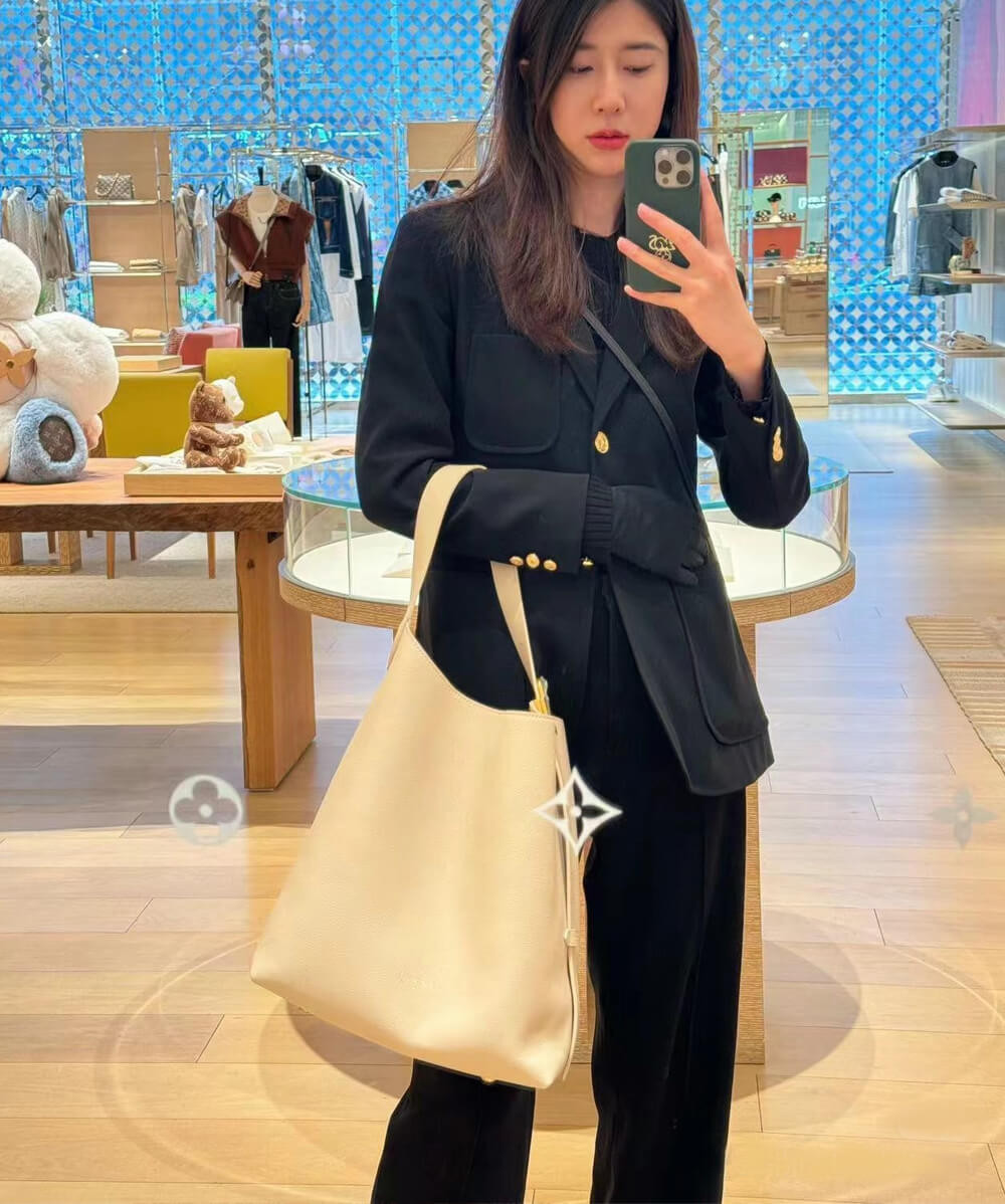 Louis Vuttion Grained Calfskin Low Key Hobo MM M25022 Limestone Gray