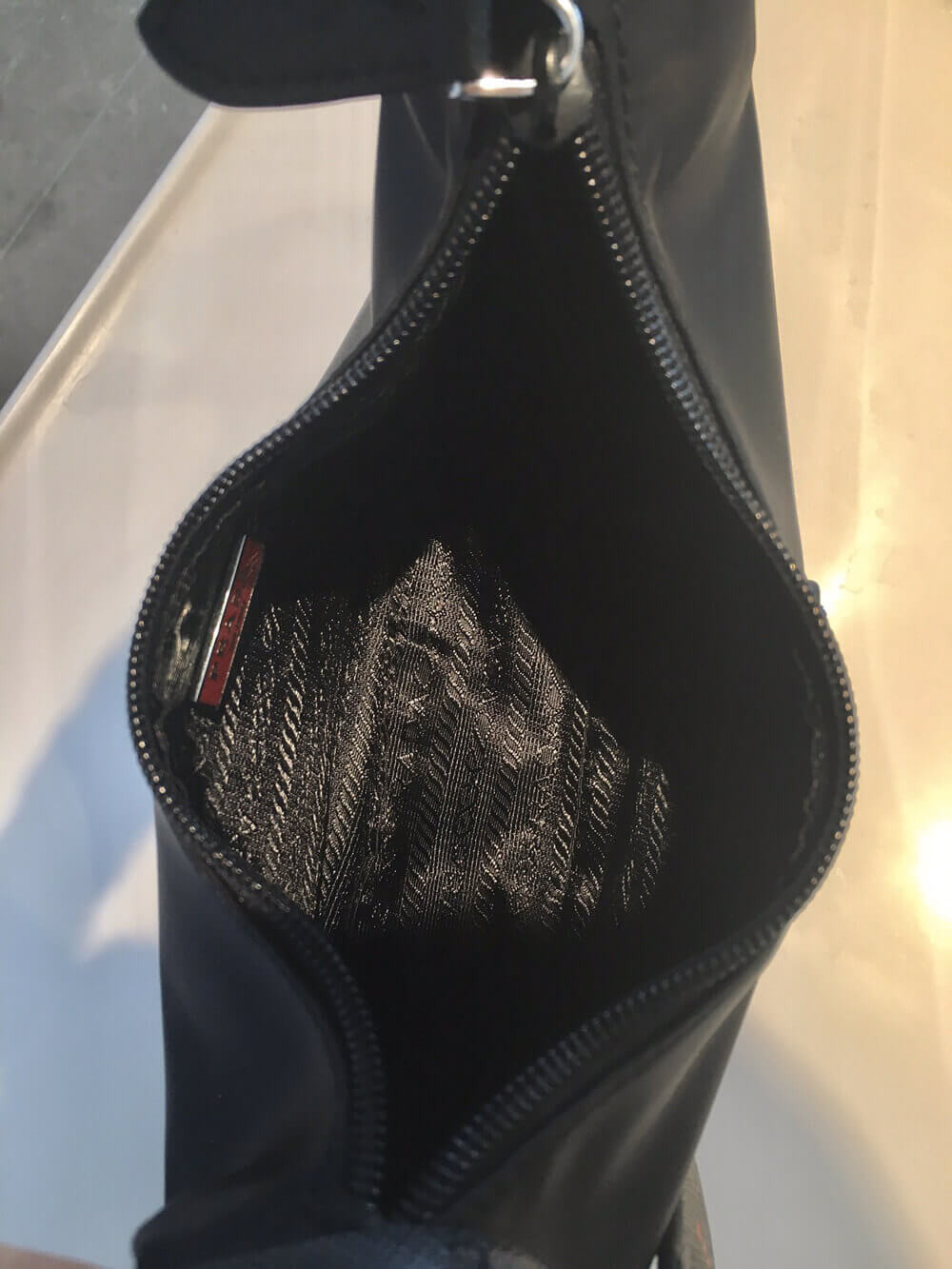 Prada Re-Edition 2000 Nylon Hobo Bag 1NE515 Black with Red Logo