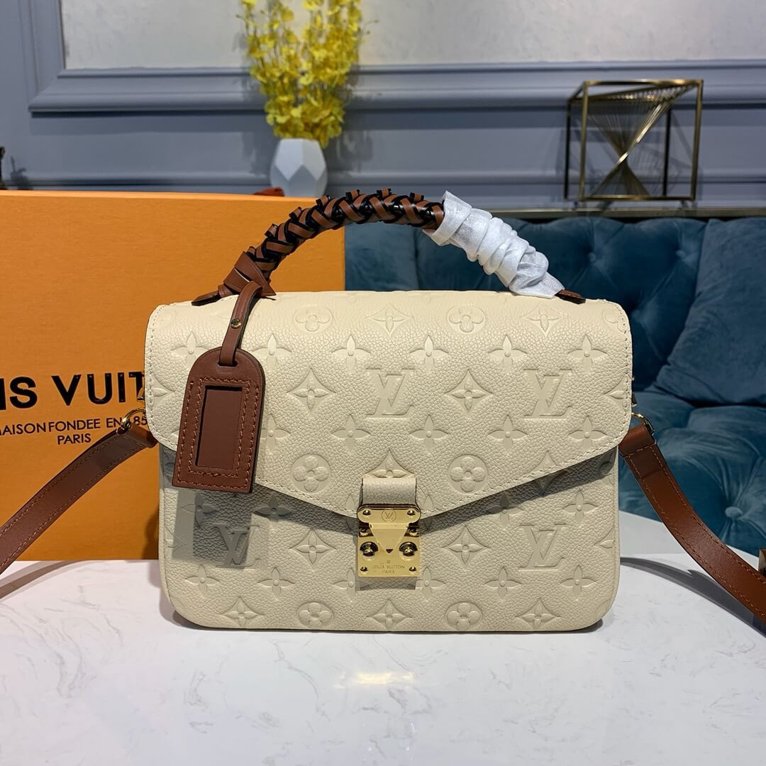 Louis Vuitton Monogram Empreinte Leather Pochette Métis M53940