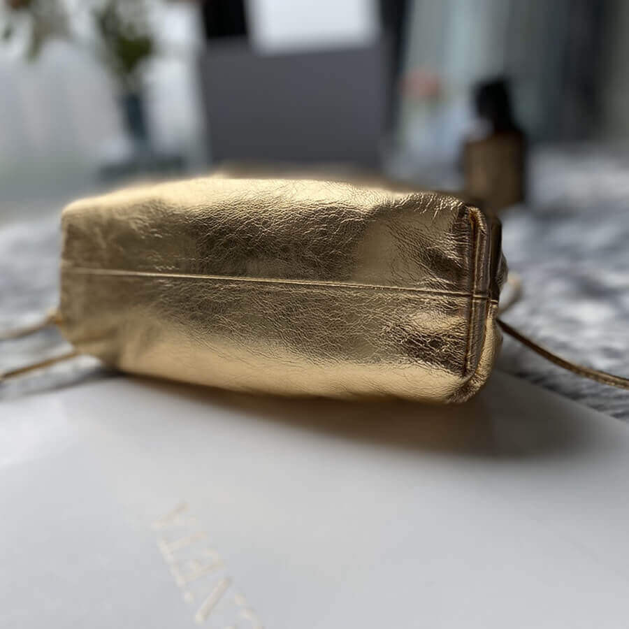 Bottega Veneta The Pouch 20  In Gold Metallic Leather 570927