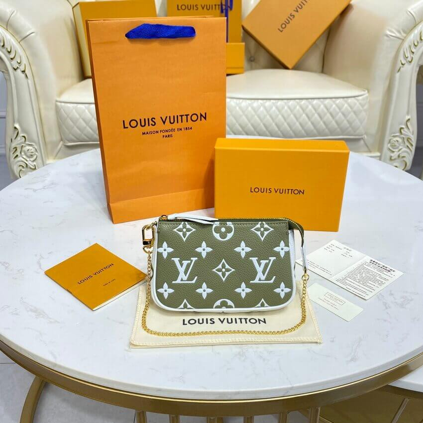Louis Vuitton Monogram Empreinte Leather Mini Pochette Accessoires M81284