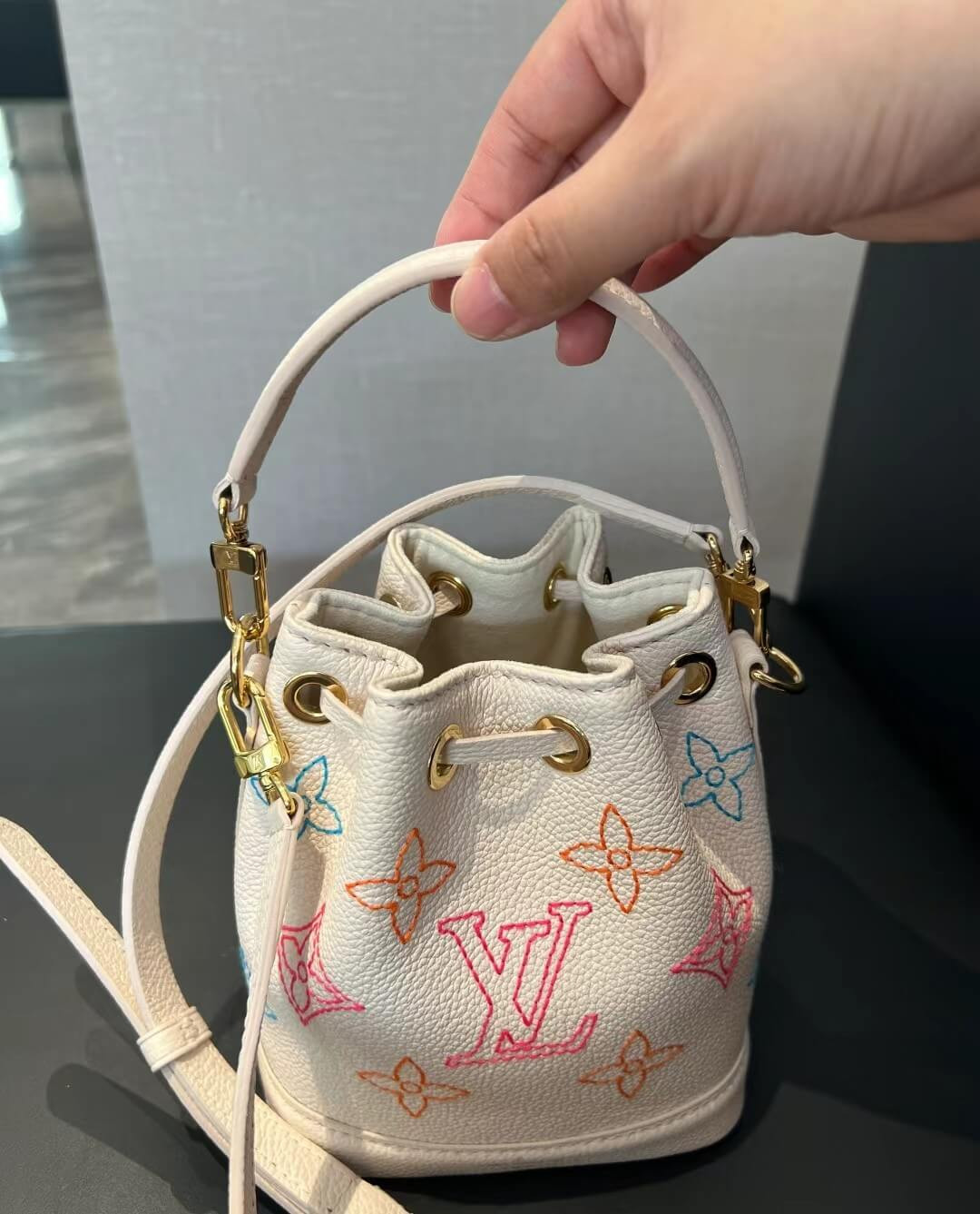 Louis Vuitton Monogram Empreinte Nano Noe Flower Patterns M23088