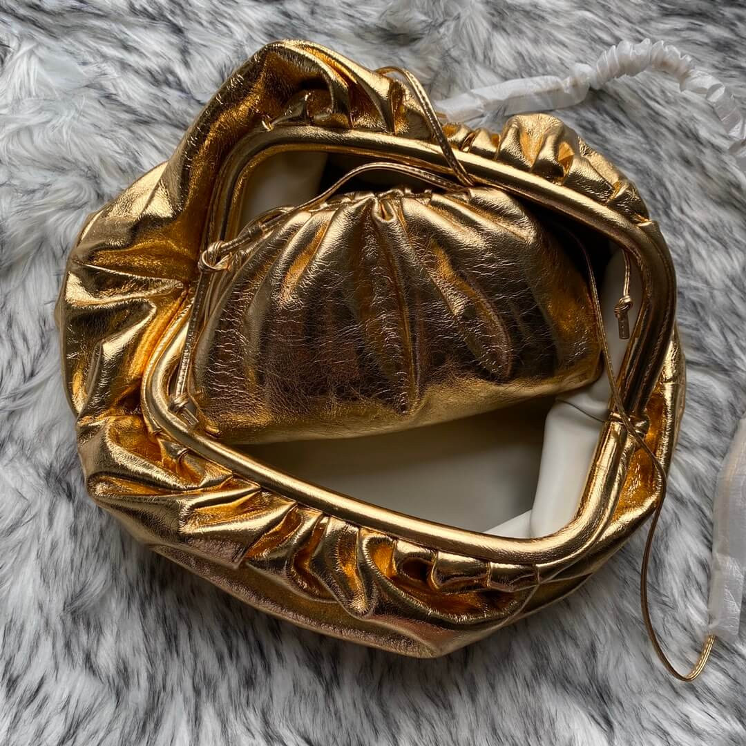 Bottega Veneta The Pouch In Gold Metallic Leather 576227