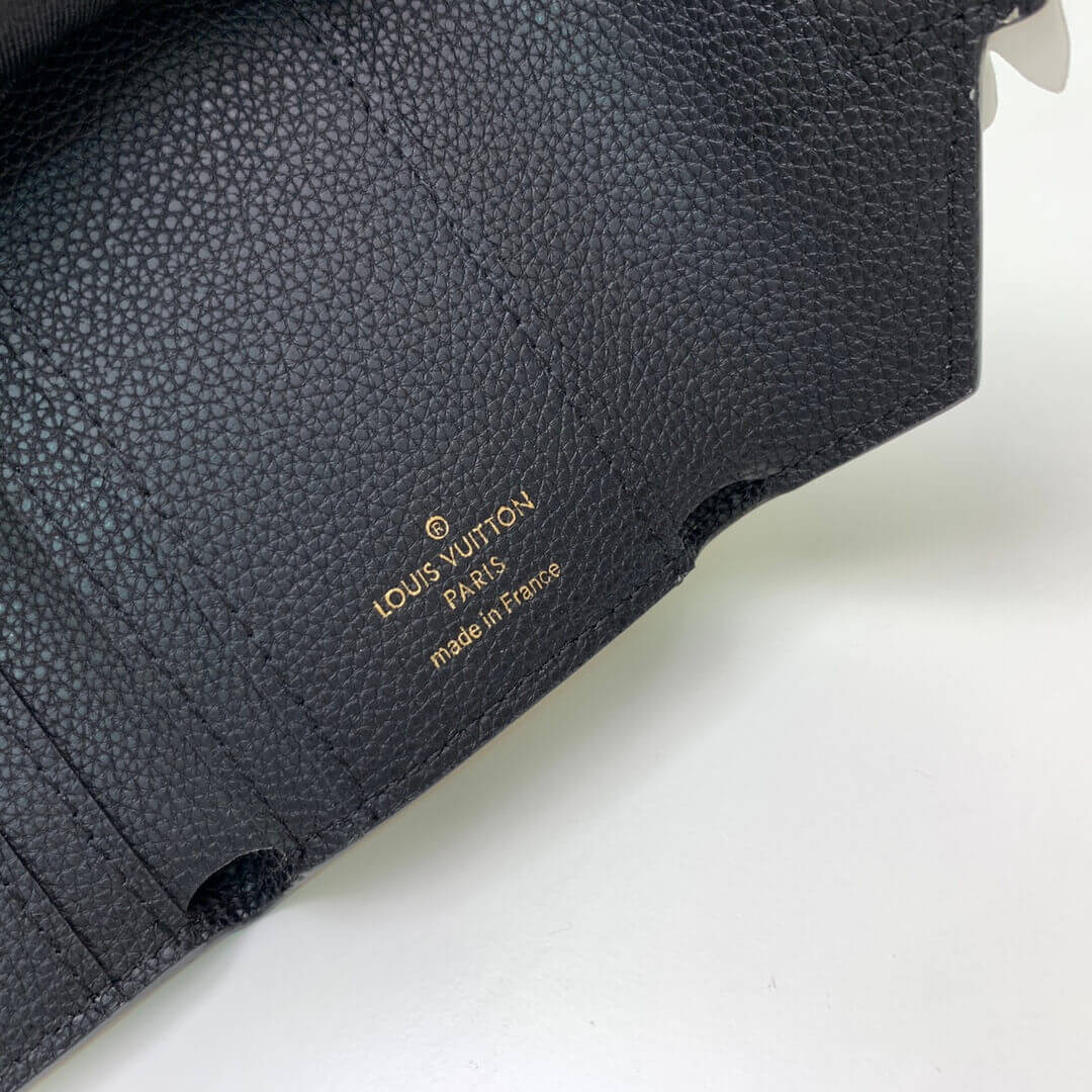 Louis Vuitton LV Crafty Zoe Wallet M69511