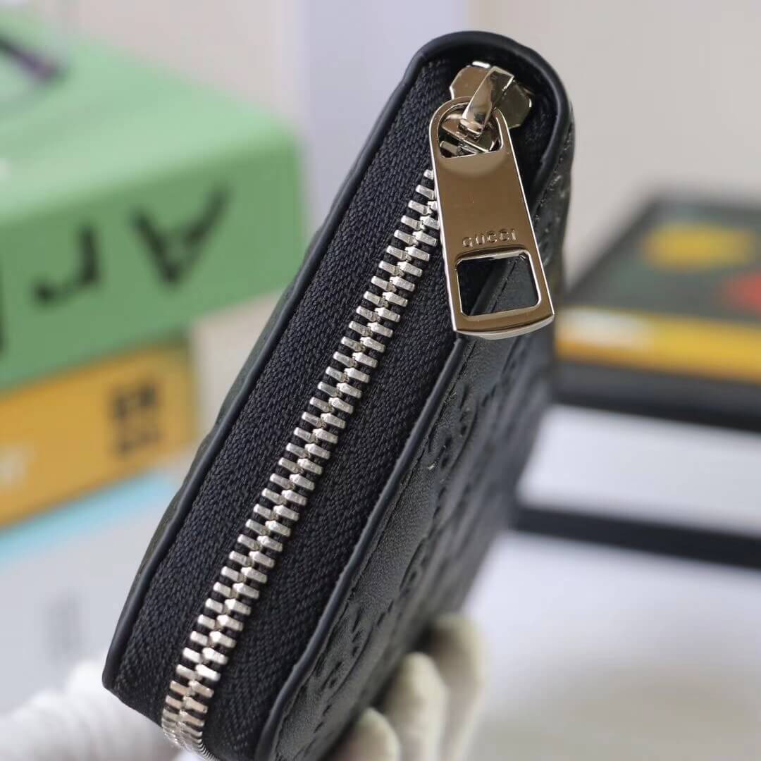 Gucci Signature Zip Around Wallet 473928