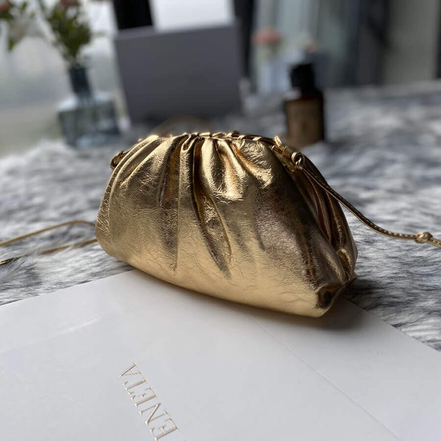 Bottega Veneta The Pouch 20  In Gold Metallic Leather 570927
