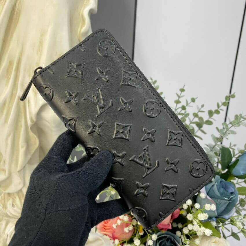 Louis Vuitton Monogram Seal Cowhide Leather Zippy Wallet Vertical M80505