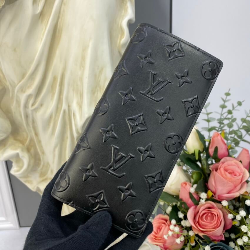 Louis Vuitton Monogram Seal Cowhide Leather Brazza Wallet M80503