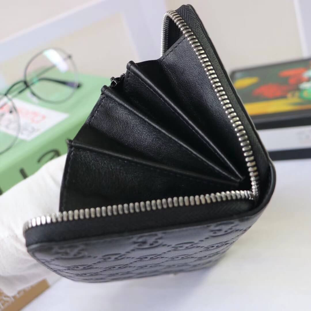 Gucci Signature Zip Around Wallet 473928