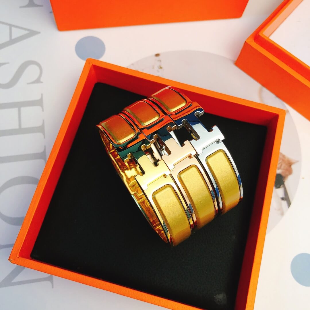 Hermes Narrow Clic H Bracelet In Yellow