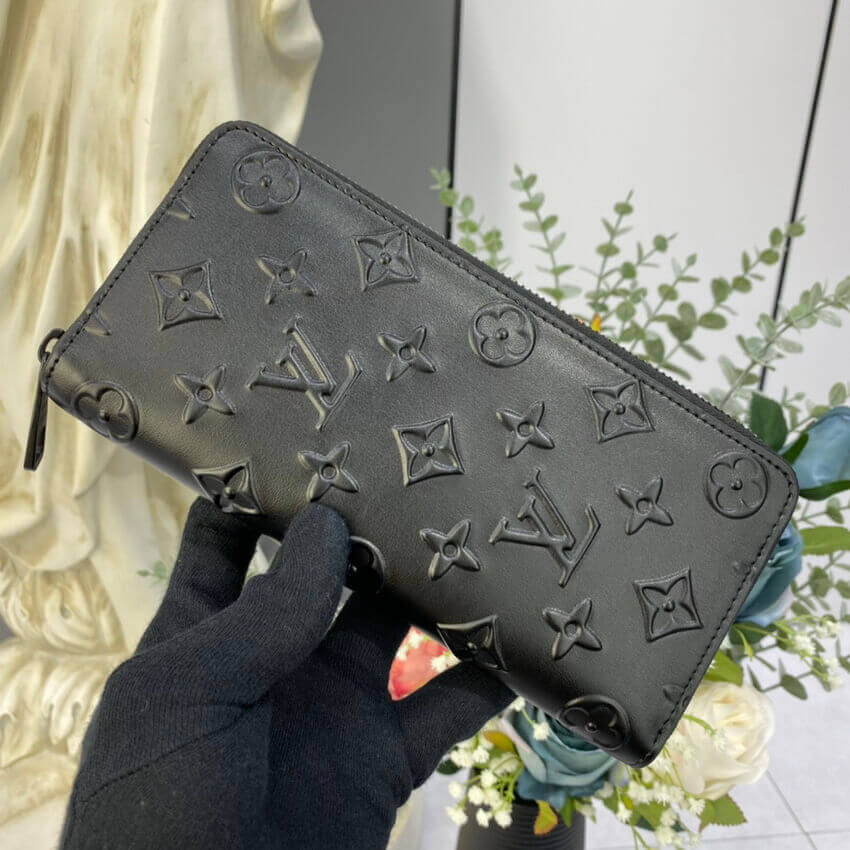 Louis Vuitton Monogram Seal Cowhide Leather Zippy Wallet Vertical M80505