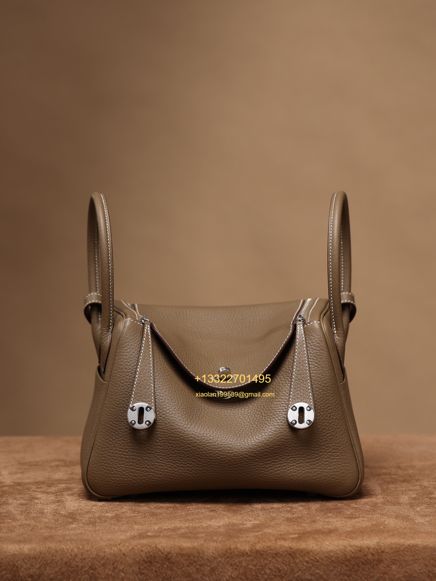 Hermès Lindy in Etoupe Grey, crafted with Hermès' exclusive Clemence leather, purely handcrafted, high-end customization edition.