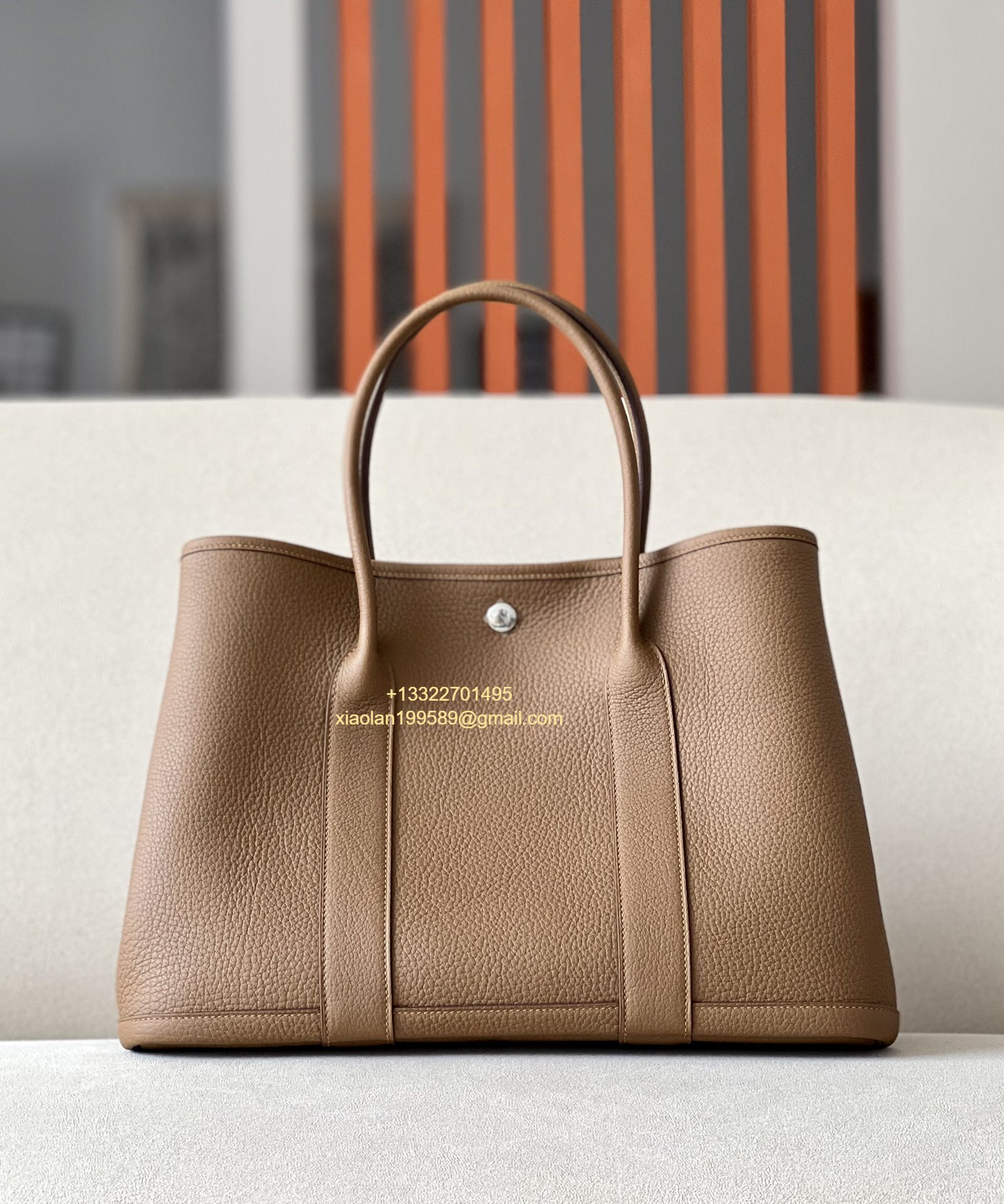 Hermès Garden Party 30/36 Bag in Negonda Calfskin, Color: Gold Brown.