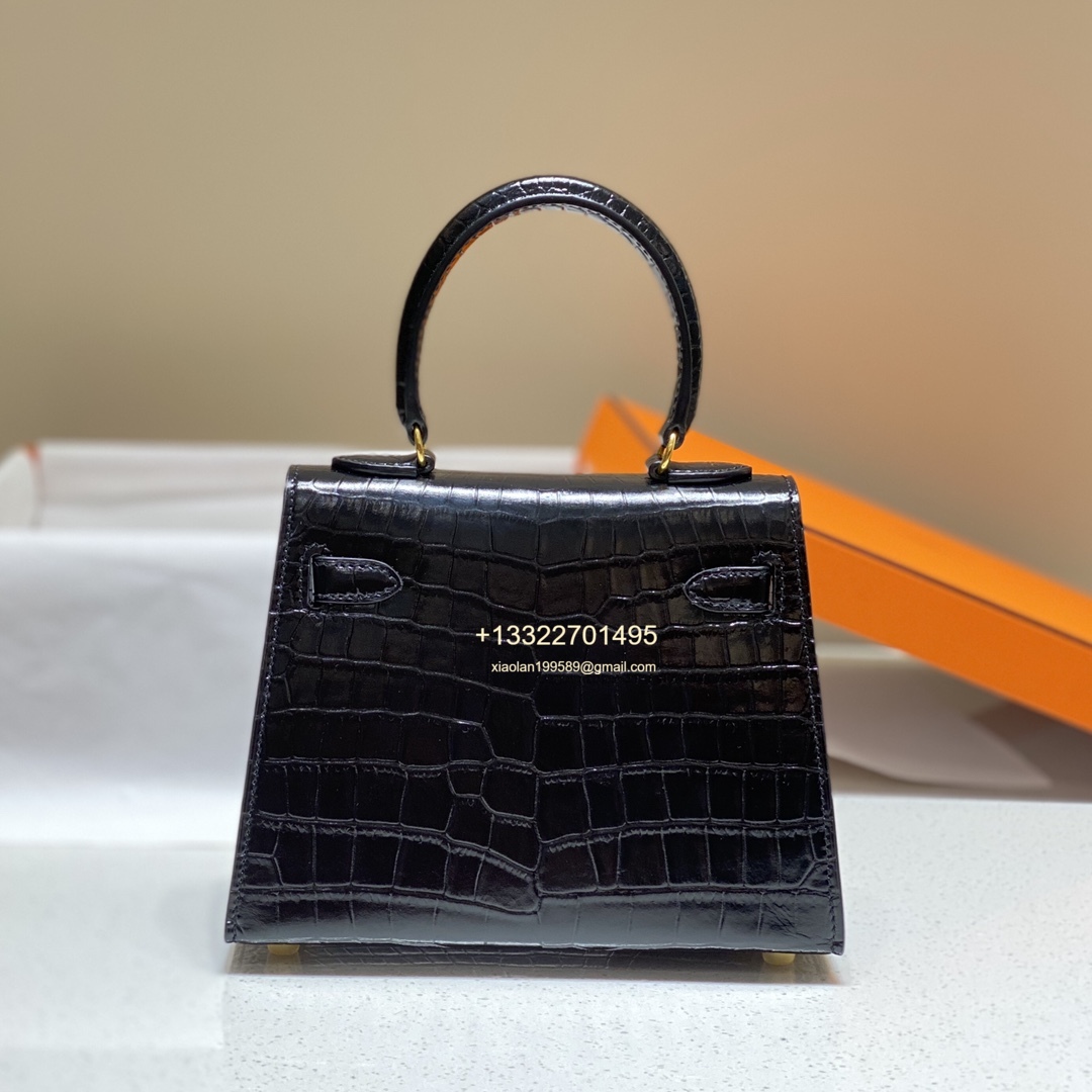 Hermès Mini Kelly 20cm in Black Purely Handcrafted with Waxed Thread Stitching, High-End Customization  This is a discontinued and rare piece, but we have it in stock. Highly coveted and rarely seen on the market, it is a favorite among Hermès bag co