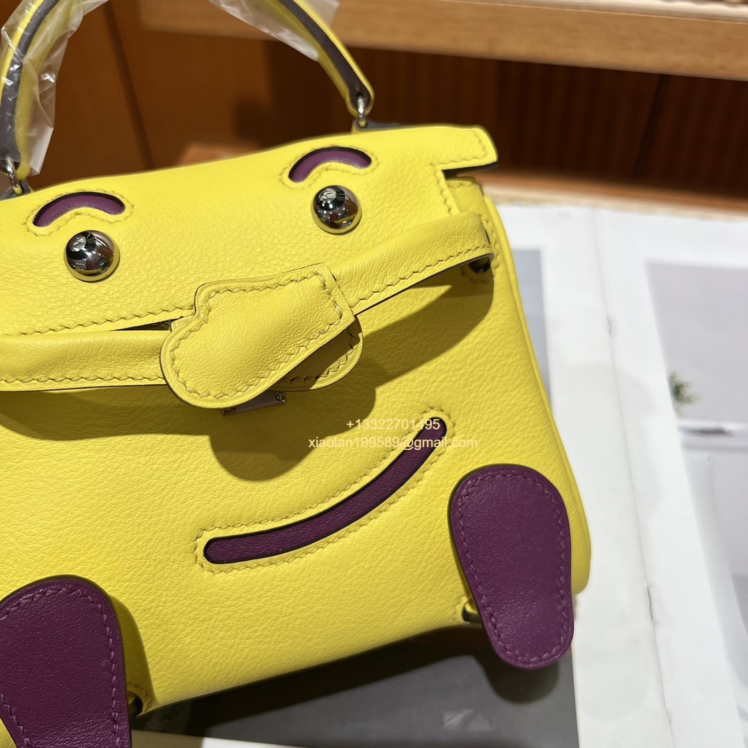 Hermès Kelly Doll Quelle Idole Picto Bag, Limited Edition in Lemon Yellow, crafted from Swift Leather.