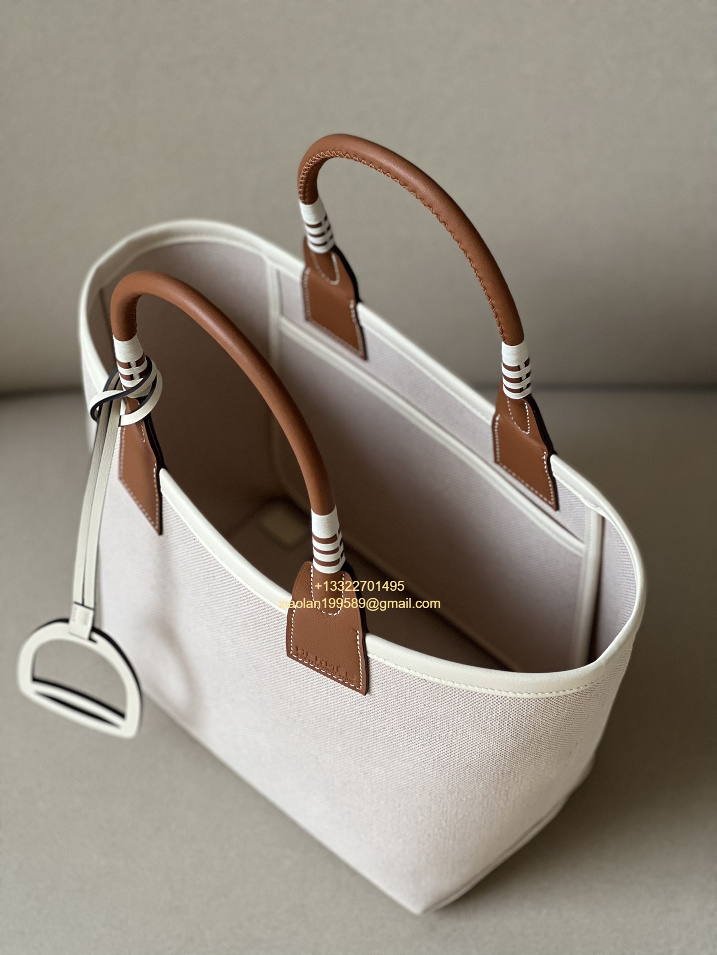 Hermès Steeple 25 Bag in H Canvas and Swift Calfskin – Cement Gray / CK37 Gold Brown.