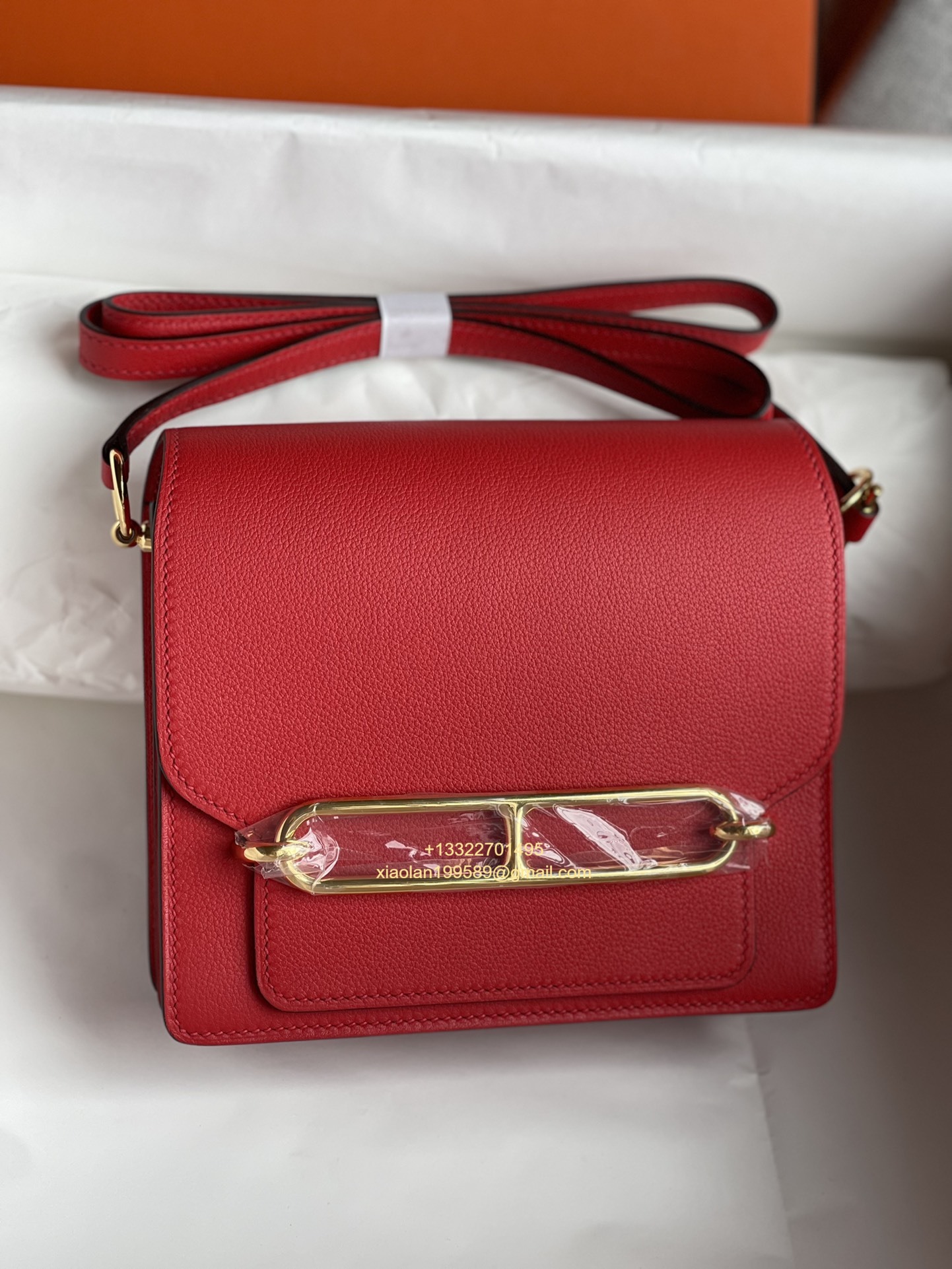 Hermès Roulis 18/23 Shoulder Bag in Evercolor Leather, Hand-stitched with Beeswax Thread. Color: Bright Red.