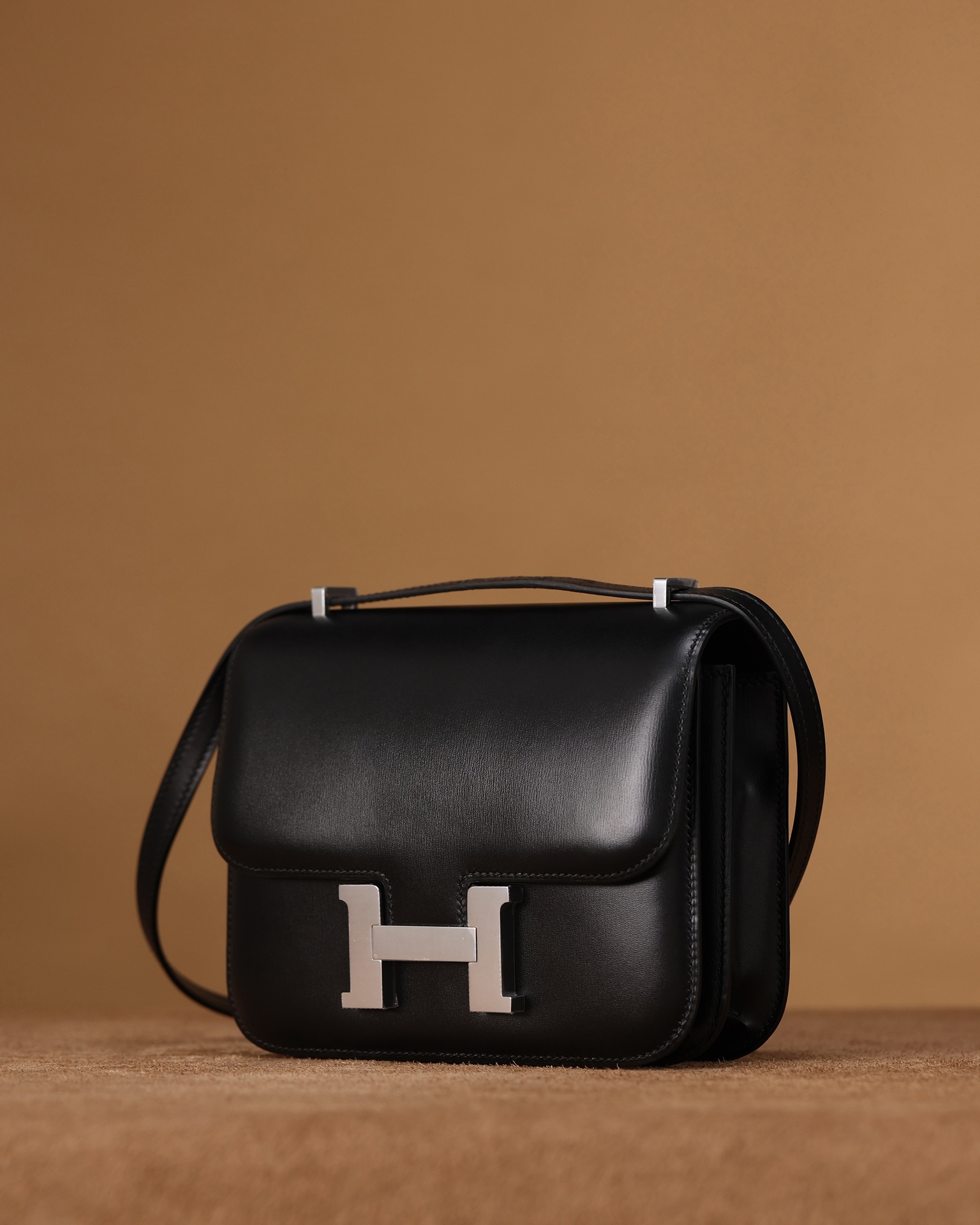 Hermès Constance 18/24 in Black BOX leather, purely handcrafted, high-end customization edition.