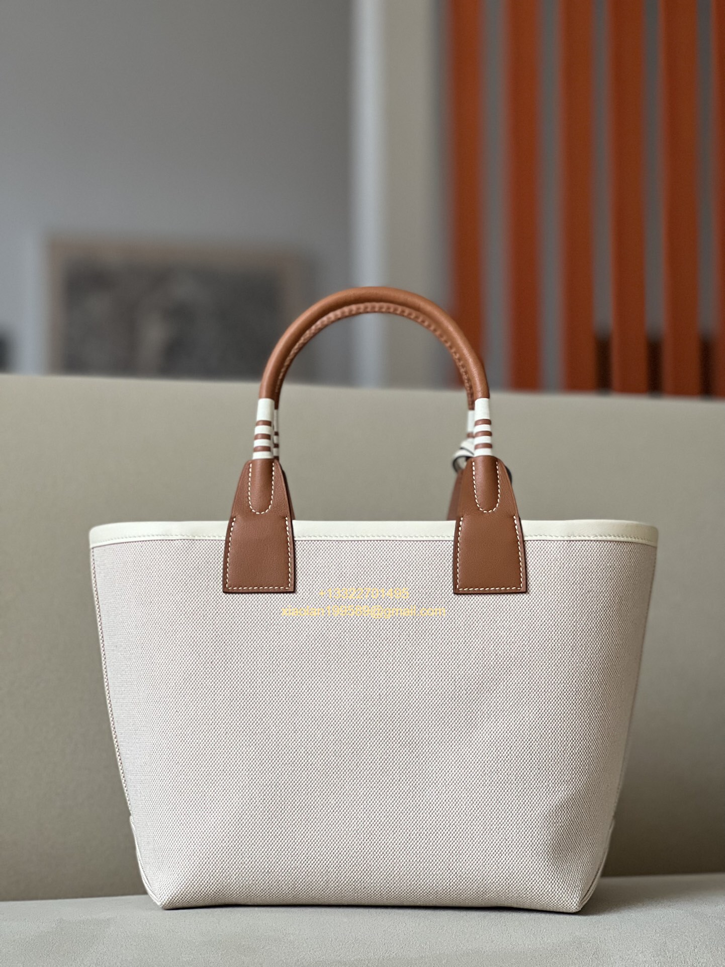 Hermès Steeple 25 Bag in H Canvas and Swift Calfskin – Cement Gray / CK37 Gold Brown.