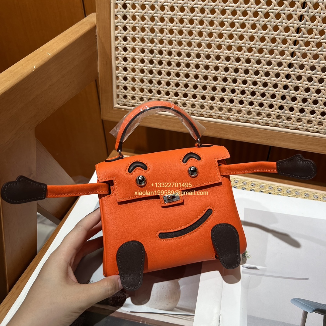 Hermès Kelly Doll Quelle Idole Picto Bag, Limited Edition in Orange, crafted from Swift Leather.
