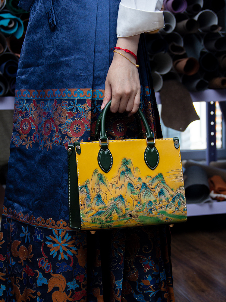 Leather Carved Tote Bag, Vintage Genuine Leather Women's Handbag, Shoulder and Crossbody Bag, featuring a traditional Chinese landscape design and new trendy style.