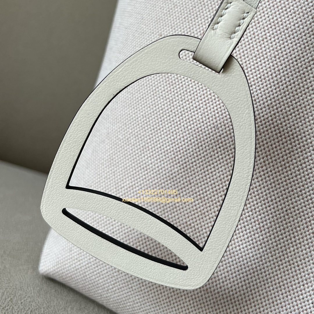 Hermès Steeple 25 Bag in H Canvas and Swift Calfskin – Cement Gray / CK37 Gold Brown.