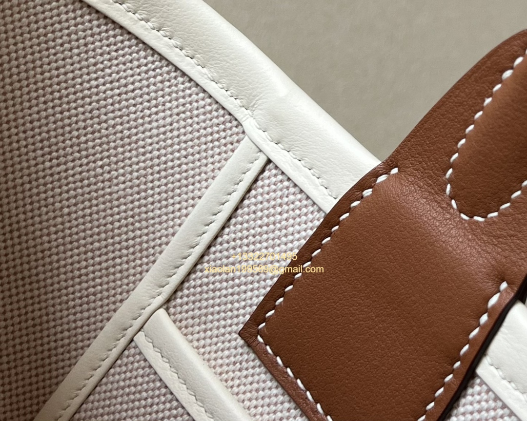 Hermès Steeple 25 Bag in H Canvas and Swift Calfskin – Cement Gray / CK37 Gold Brown.