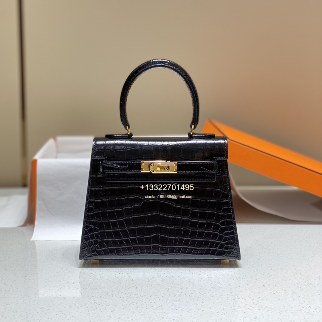 Hermès Mini Kelly 20cm in Black Purely Handcrafted with Waxed Thread Stitching, High-End Customization  This is a discontinued and rare piece, but we have it in stock. Highly coveted and rarely seen on the market, it is a favorite among Hermès bag co