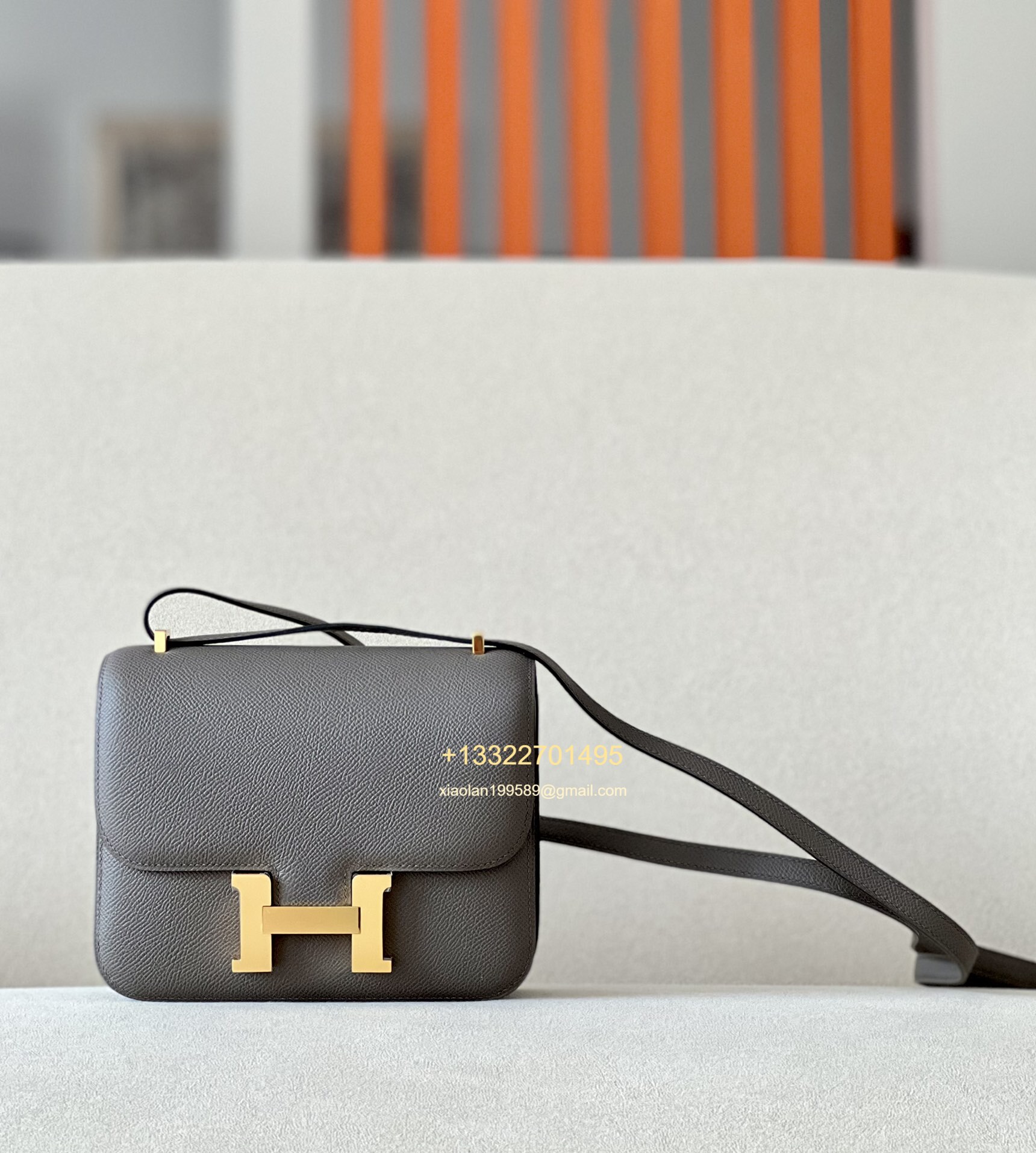 Hermès Constance 18/24 in Etoupe Grey Epsom leather, purely handcrafted, high-end customization edition.