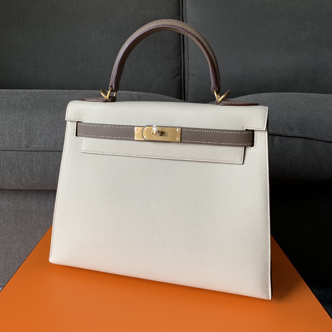 Hermès Kelly 25/28/32cm in Epsom leather, fully hand-stitched with waxed thread, customized in color-block design.