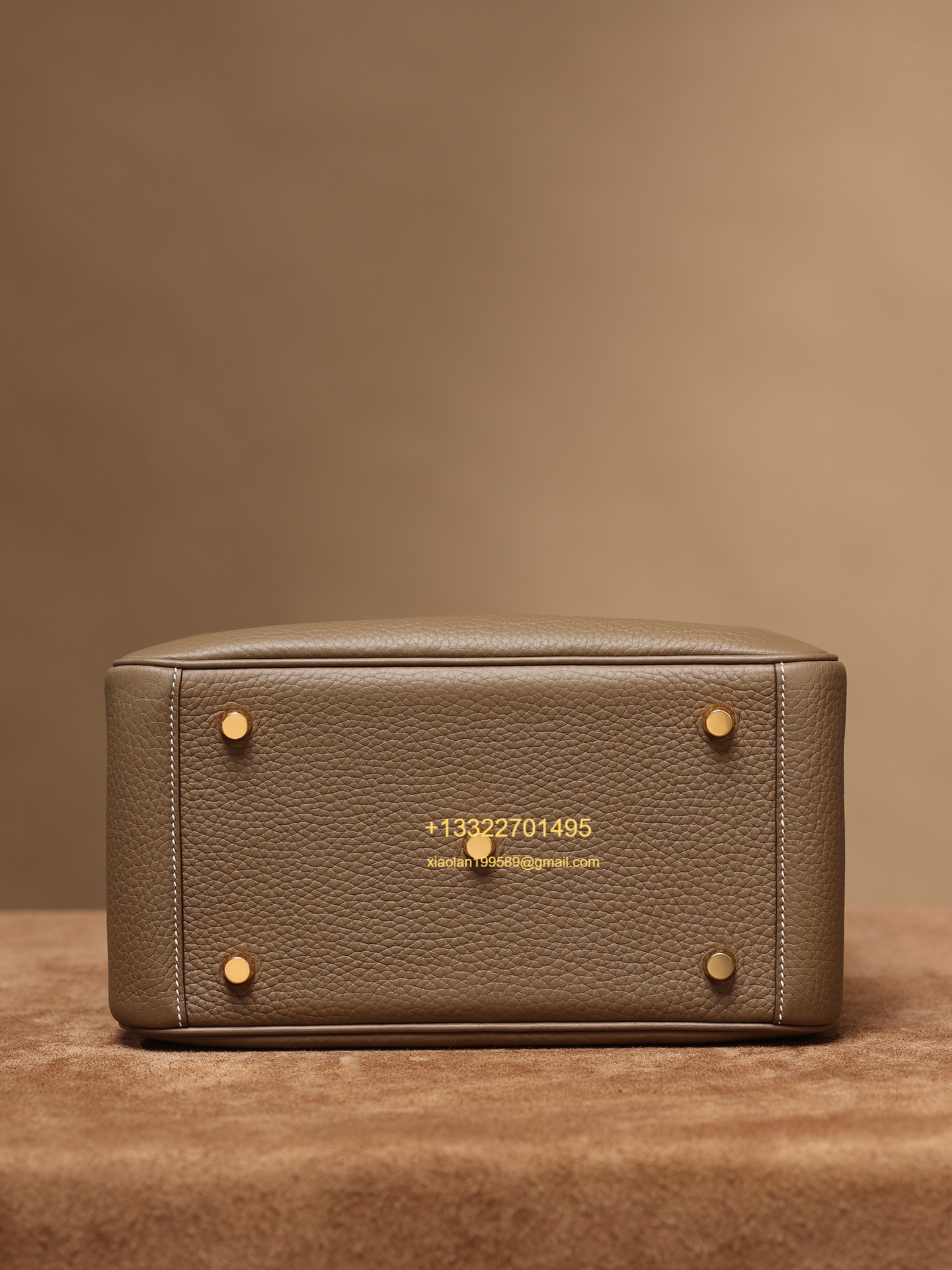 Hermès Lindy in Etoupe Grey, crafted with Hermès' exclusive Clemence leather, purely handcrafted, high-end customization edition.