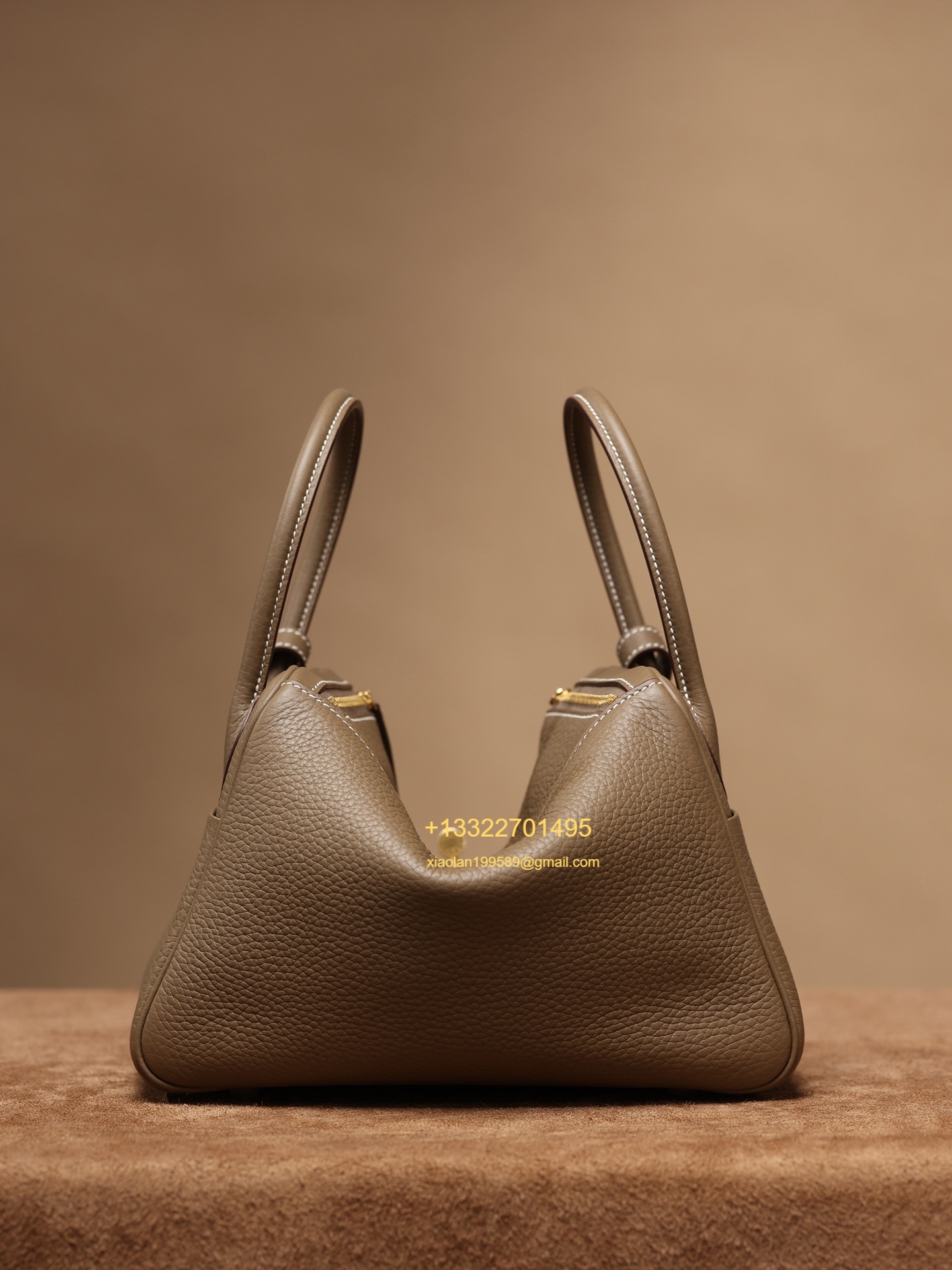 Hermès Lindy in Etoupe Grey, crafted with Hermès' exclusive Clemence leather, purely handcrafted, high-end customization edition.