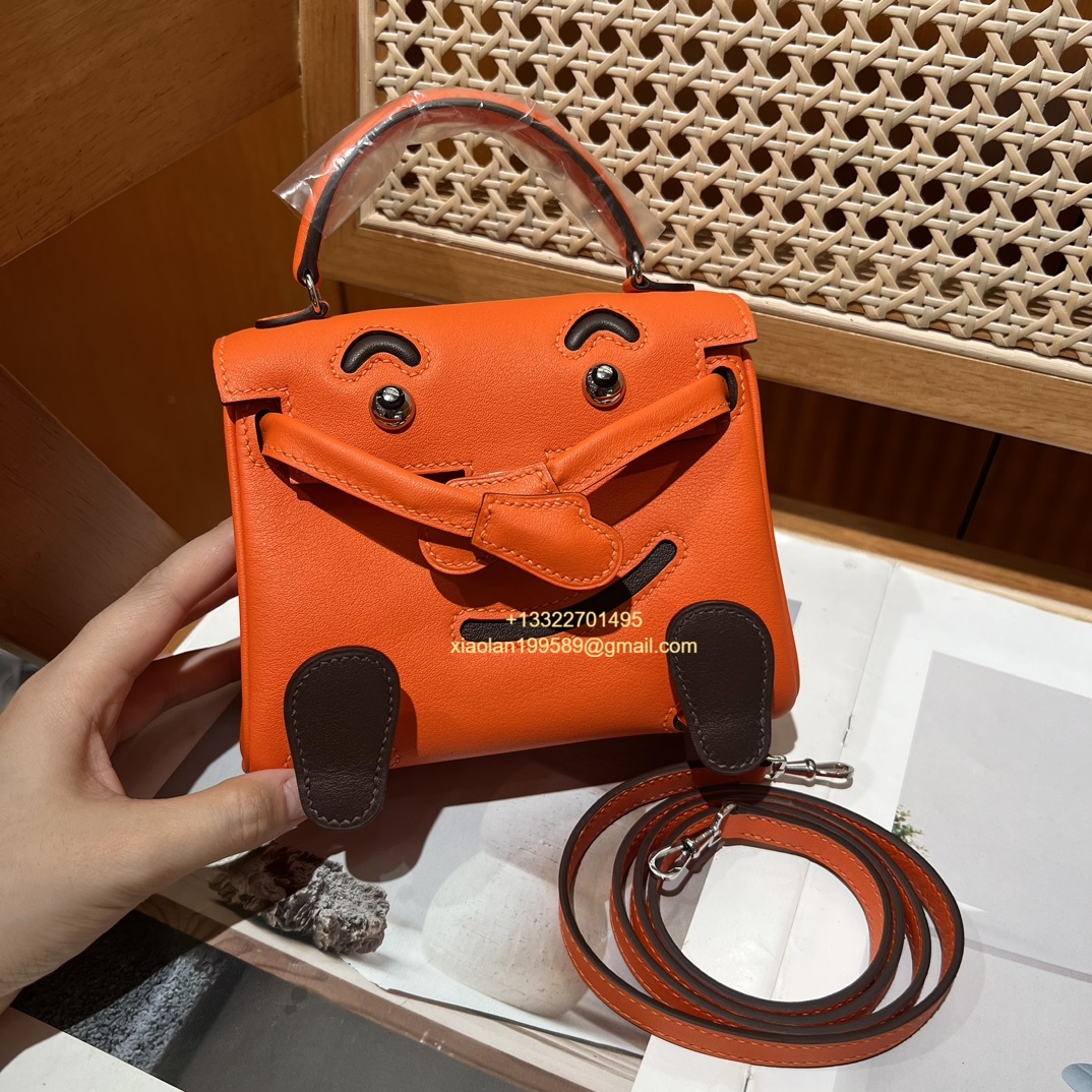 Hermès Kelly Doll Quelle Idole Picto Bag, Limited Edition in Orange, crafted from Swift Leather.