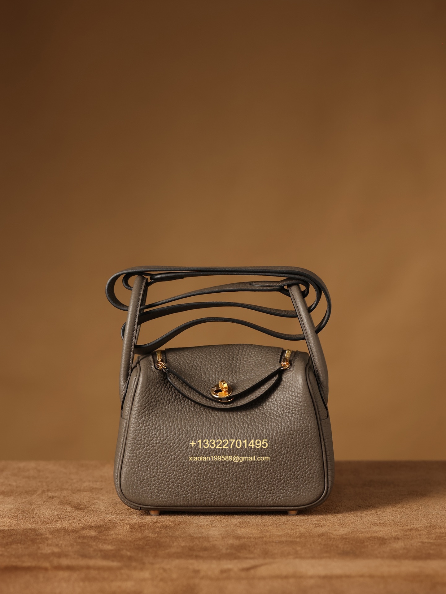 Hermès Lindy Mini 19cm in Pewter Grey, crafted with Hermès' exclusive Clemence leather, purely handcrafted, high-end customization edition.